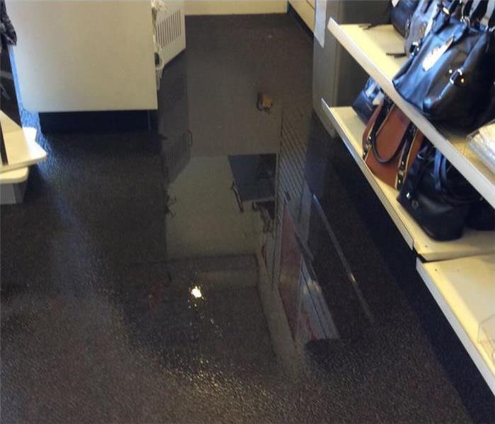 Retail business with water damage to flooring