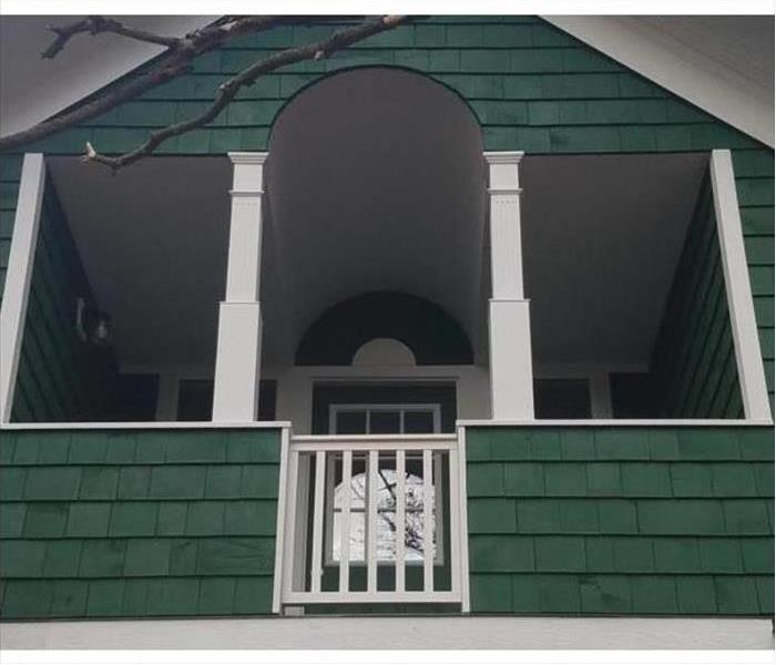 Upper story and balcony restored