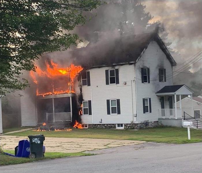 House with outside porch on fire